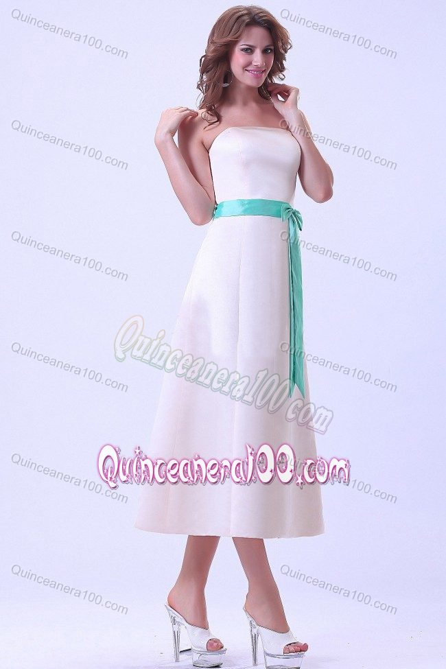 Champagne Tea-length Satin Dama Dress With a Turquoise Sash