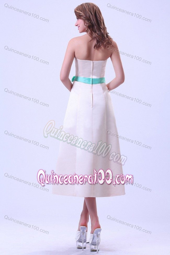 Champagne Tea-length Satin Dama Dress With a Turquoise Sash