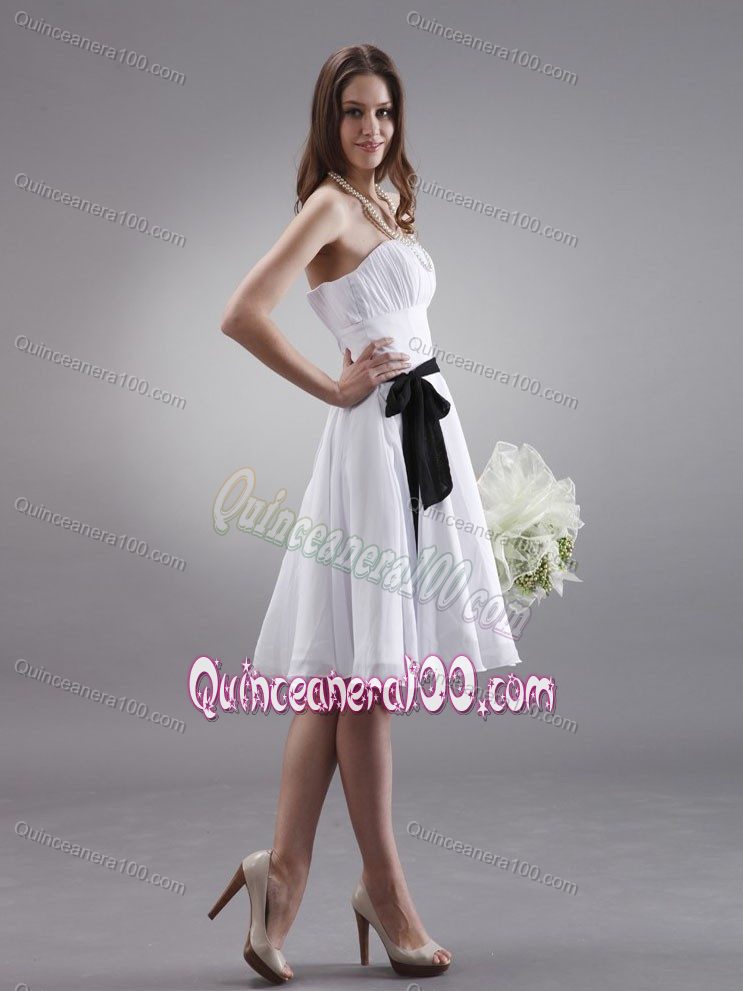 White Knee-length Chiffon Dama Dress with Ruches and Black Sash