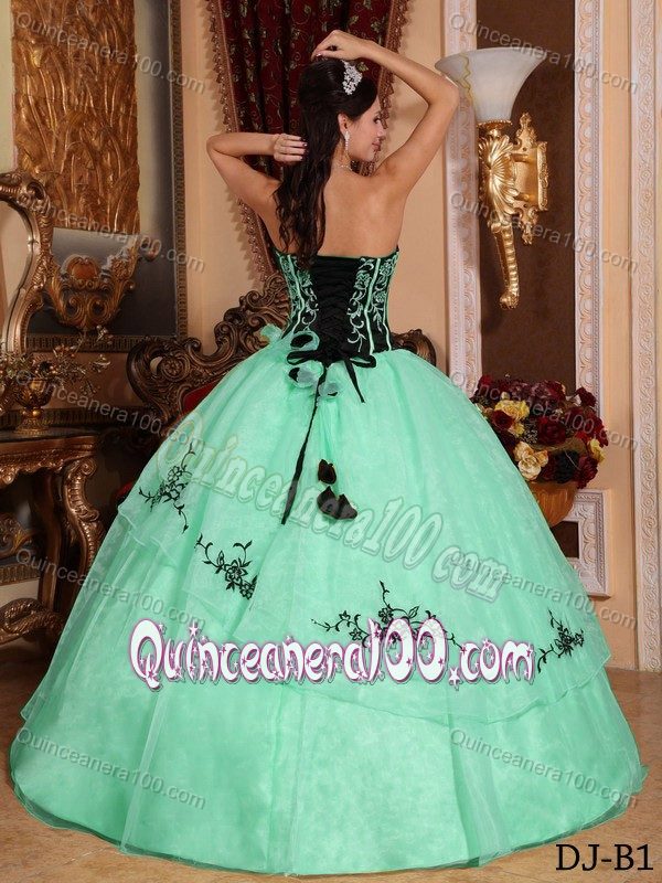 Apple Green and Black Quinceanera Dress with Embroidery and Flowers