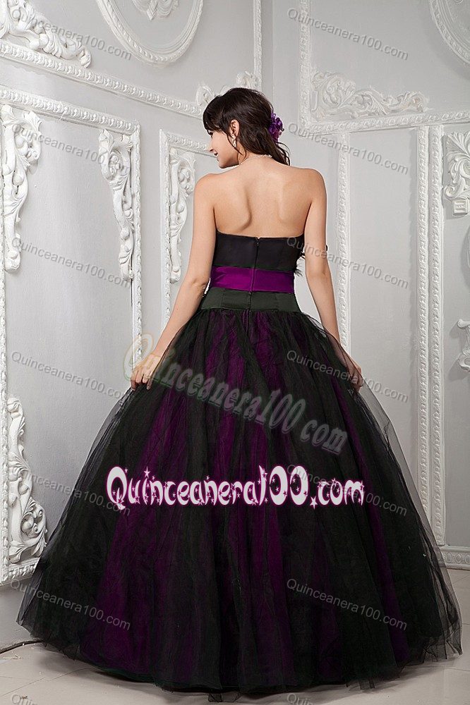 Black and Fuchsia Quince Dresses with Feather and Sash Accent