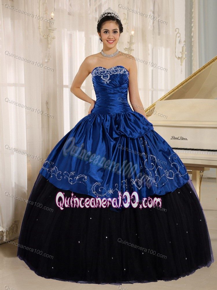 royal blue and black gown