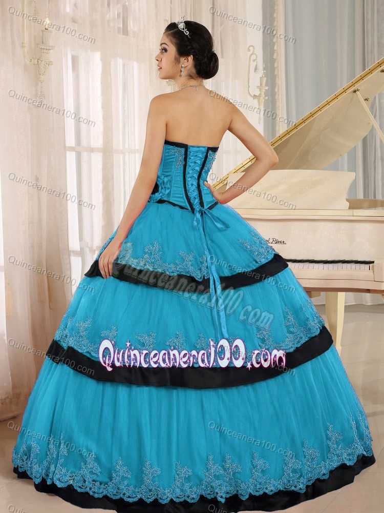 Aqua Blue and Black Quinces Dresses with Lace Hem and Flowers