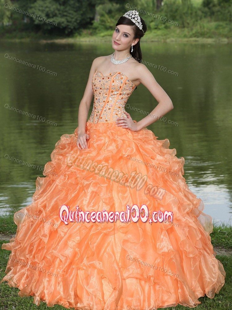 Best Orange Ruffled Layers Strapless Quinceanera Gown with Beading