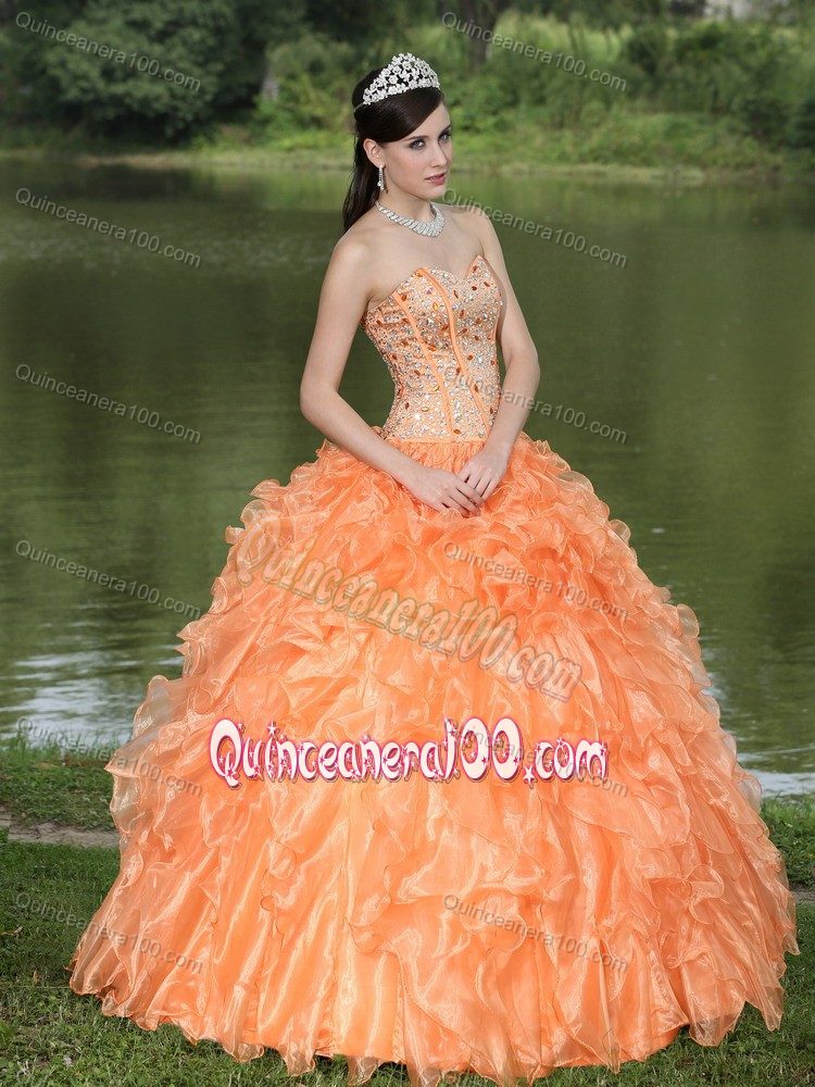 Best Orange Ruffled Layers Strapless Quinceanera Gown with Beading