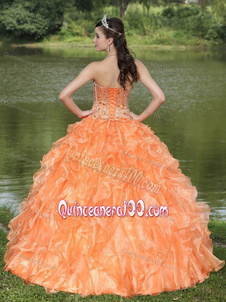 Best Orange Ruffled Layers Strapless Quinceanera Gown with Beading